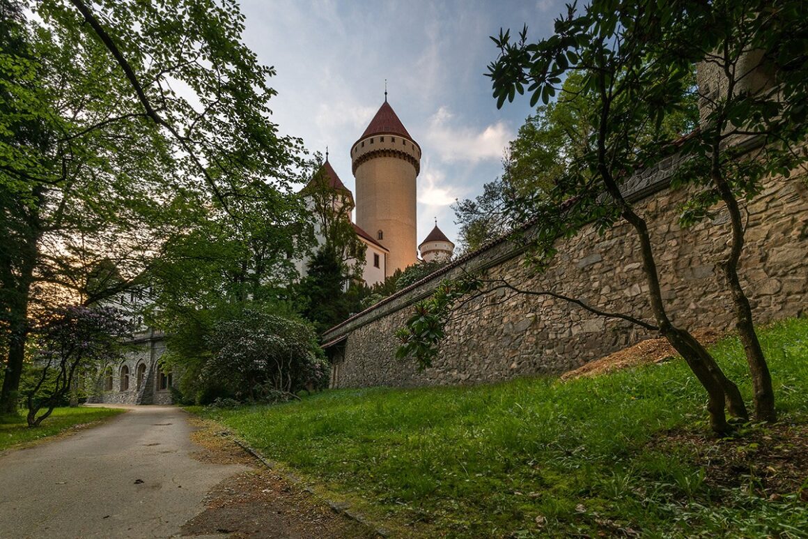 White towers with red pointy tops mark Konopiste Castle located in Benesov, south of Prague