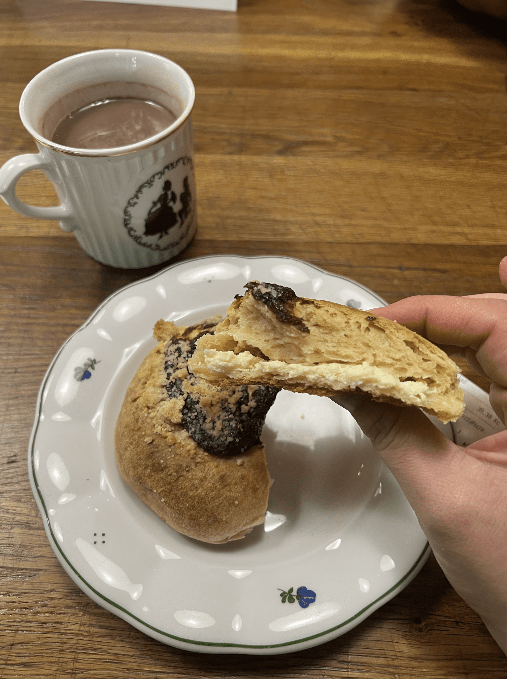 A Czech kolac is filled with farmers cheese and topped with plum jam