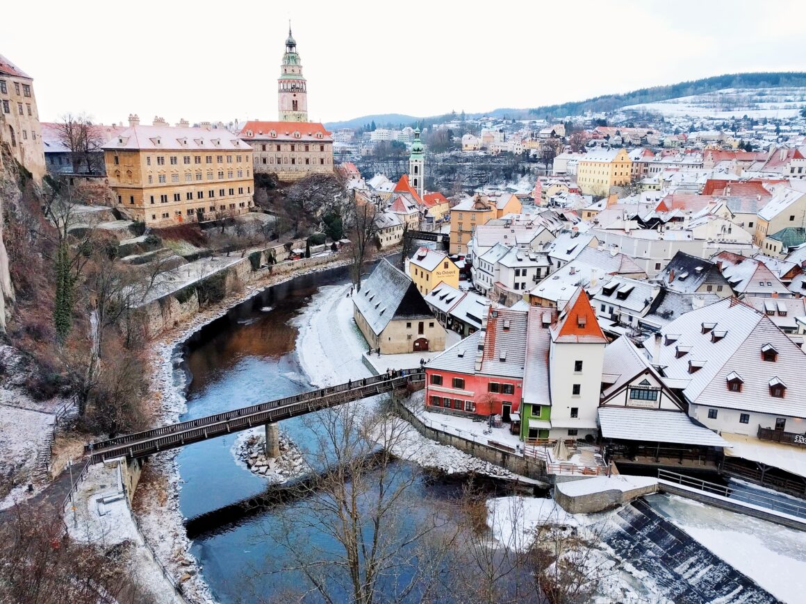 The Czech town of Cesky Krumlov covered in snow during Christmastime