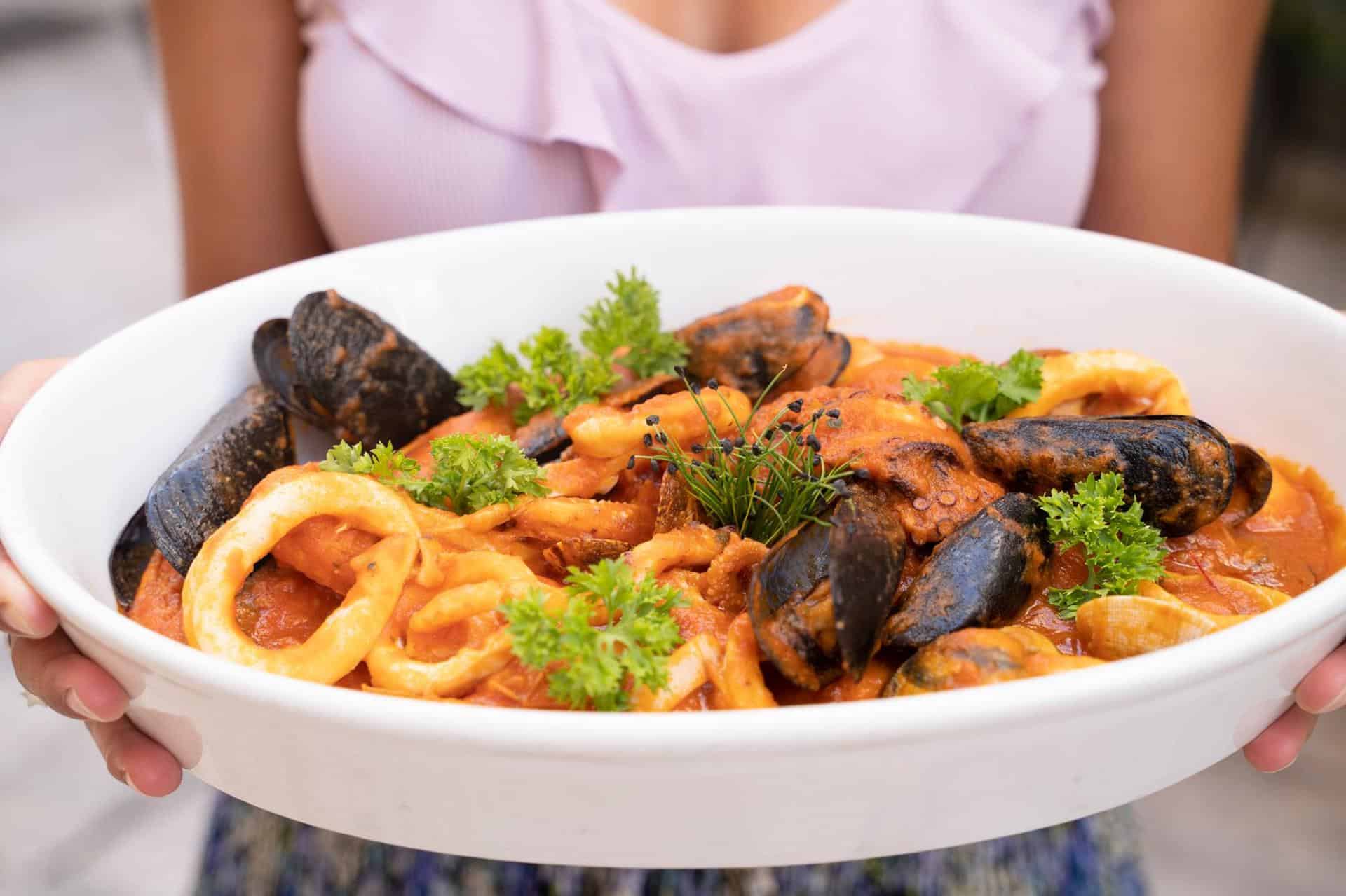 One of the seafood dishes at Ristorante Borgo Antico with mussels and clams, one of the best restaurants in Bari