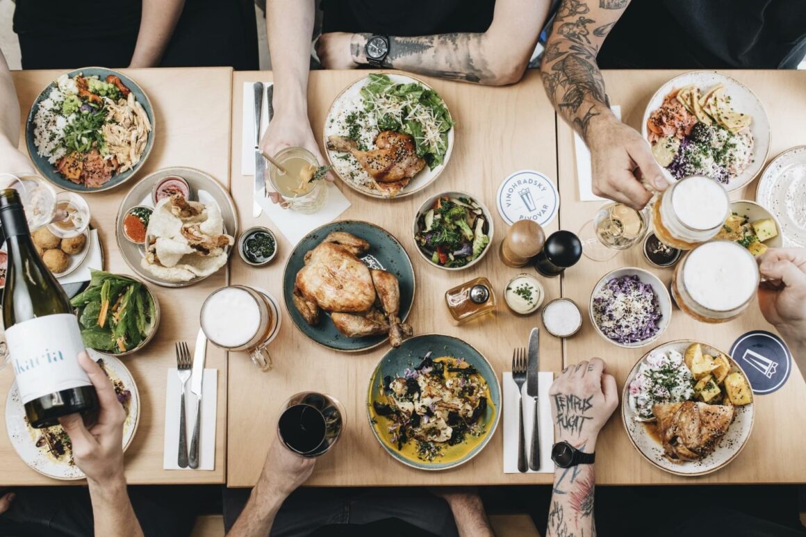 People gather to eat food at Kro Kitchen, one of the best restaurants in Prague.