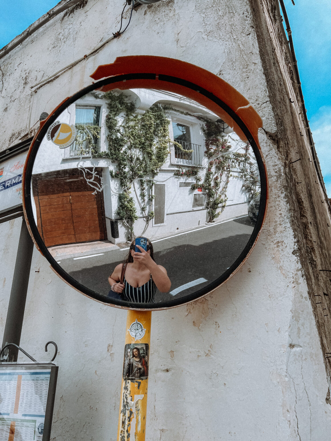 A girl poses in Positano, one of the best things to do in Positano