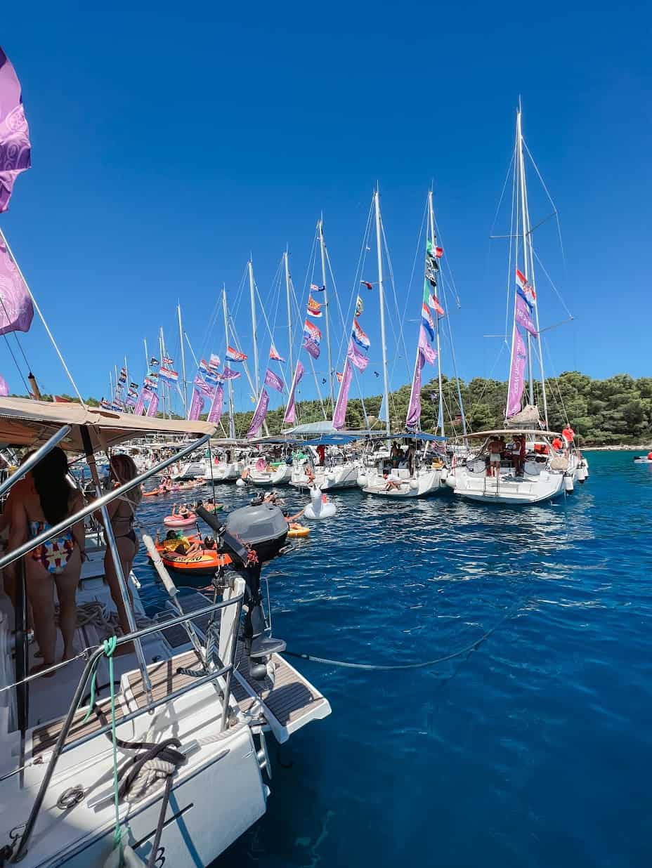 Boats rafted together for Tunnel Raft during Yacht Week Croatia