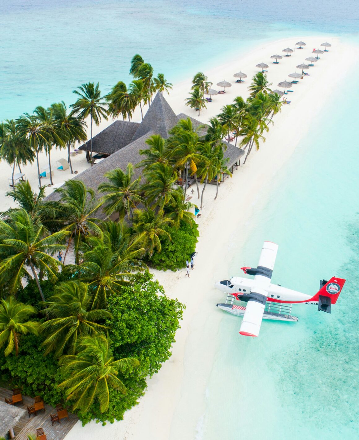 The beautiful blue waters of the Maldives islands and a seaplane, best visited during December to February, one of the best times to visit the Maldives