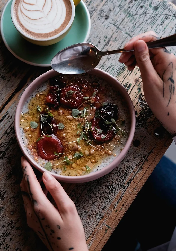 A bowl of breakfast oatmeal at Cafe Letka, one of the best brunch spots in Prague