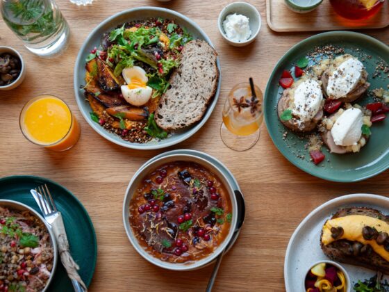 A table full of breakfast food at Mezi Srnky, one of the best brunch spots in Prague