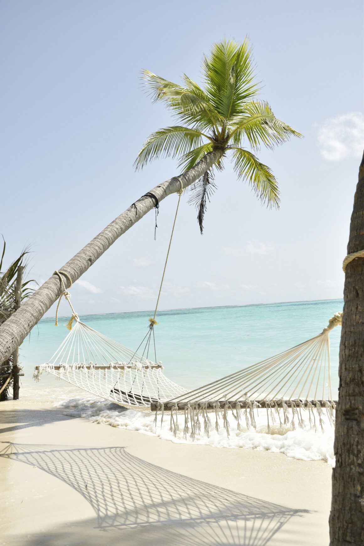 A hammock on a local island in the Maldives, perfect for a budget trip to the Maldives