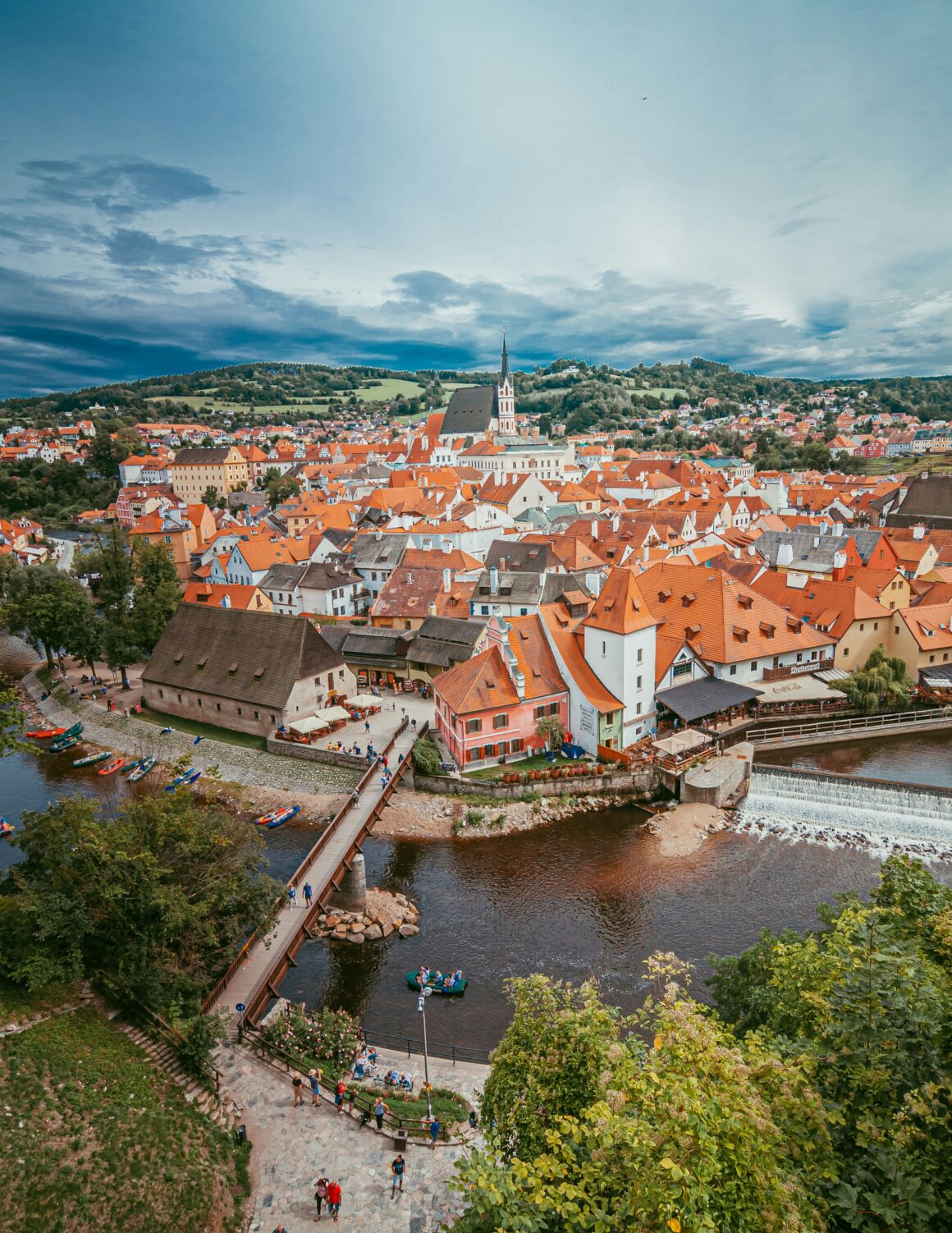 A river winds through the city of Cesky Krumlov, one of the best places to visit in Czech Republic