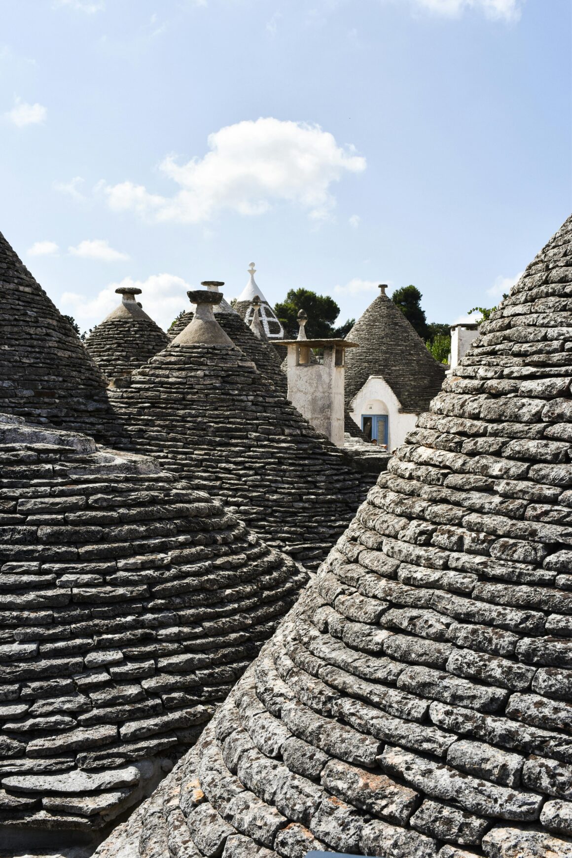 My 7 days in Puglia, Italy itinerary features a stop to see the trulli homes, pictured here